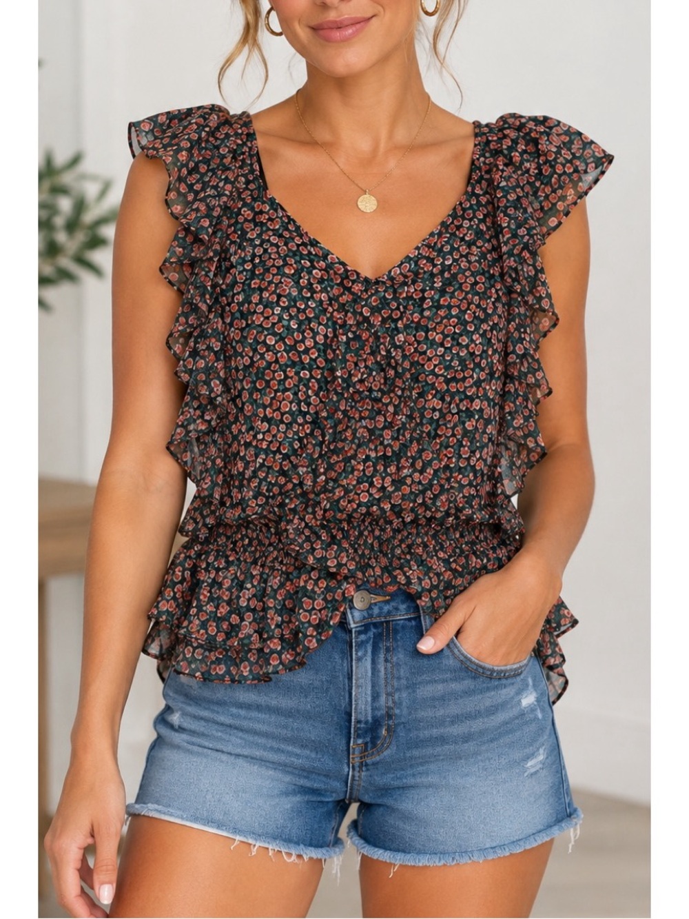 Rosette black floral ruffle blouse size small